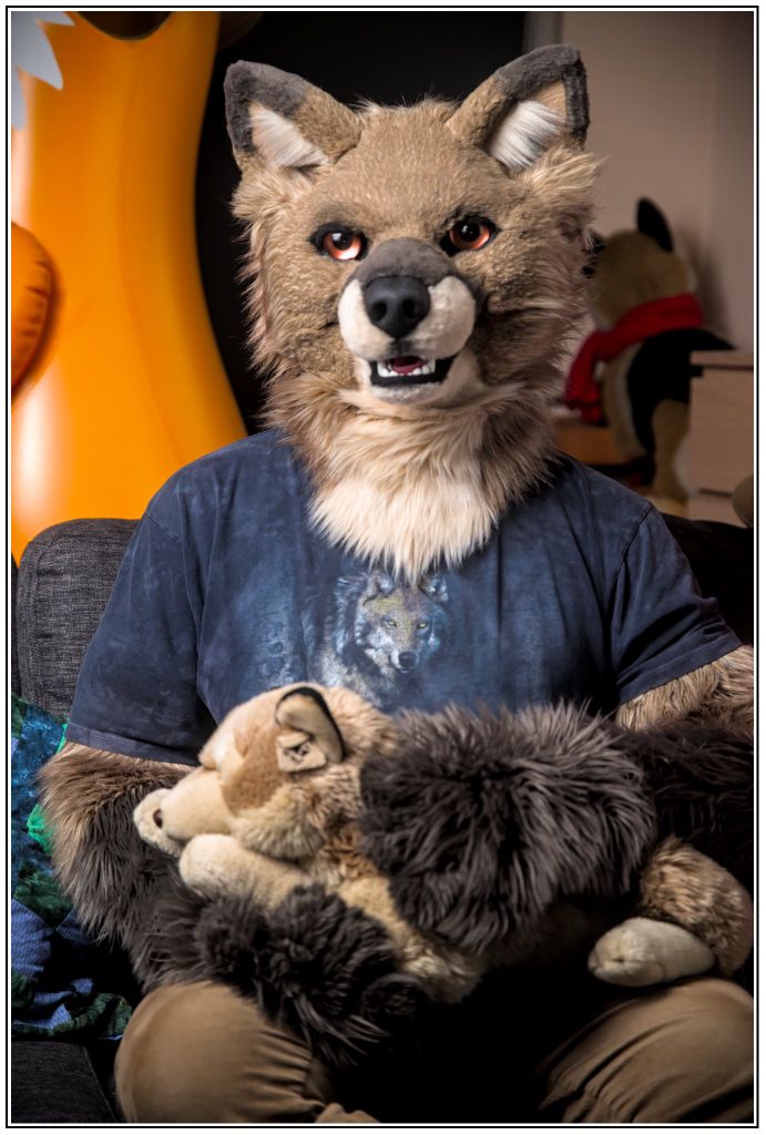 Self-portrait of Botch Frivarg with one of their favourite plush toys